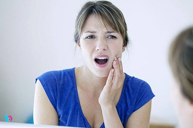 缓解智齿疼痛的方法(牙齿烂了一个洞很痛怎么办)